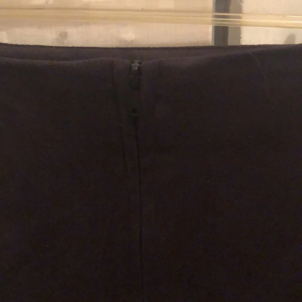 Black suede like mini skirt with cutout designs - Picture 6 of 8